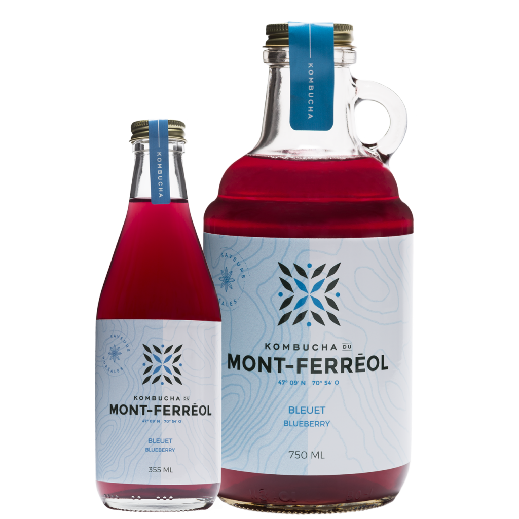 Transparent labeled bottles of Kombucha Mont-Ferréol